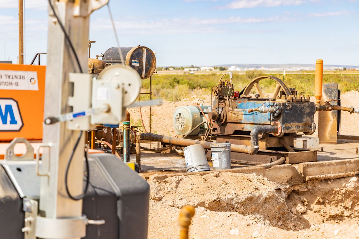 Injection pump equipment and piping on the disposal pad
